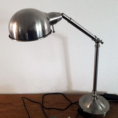 A Desk, Laptop, and Lamp